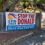 Anti Trump Flag on Fence 2024 Election